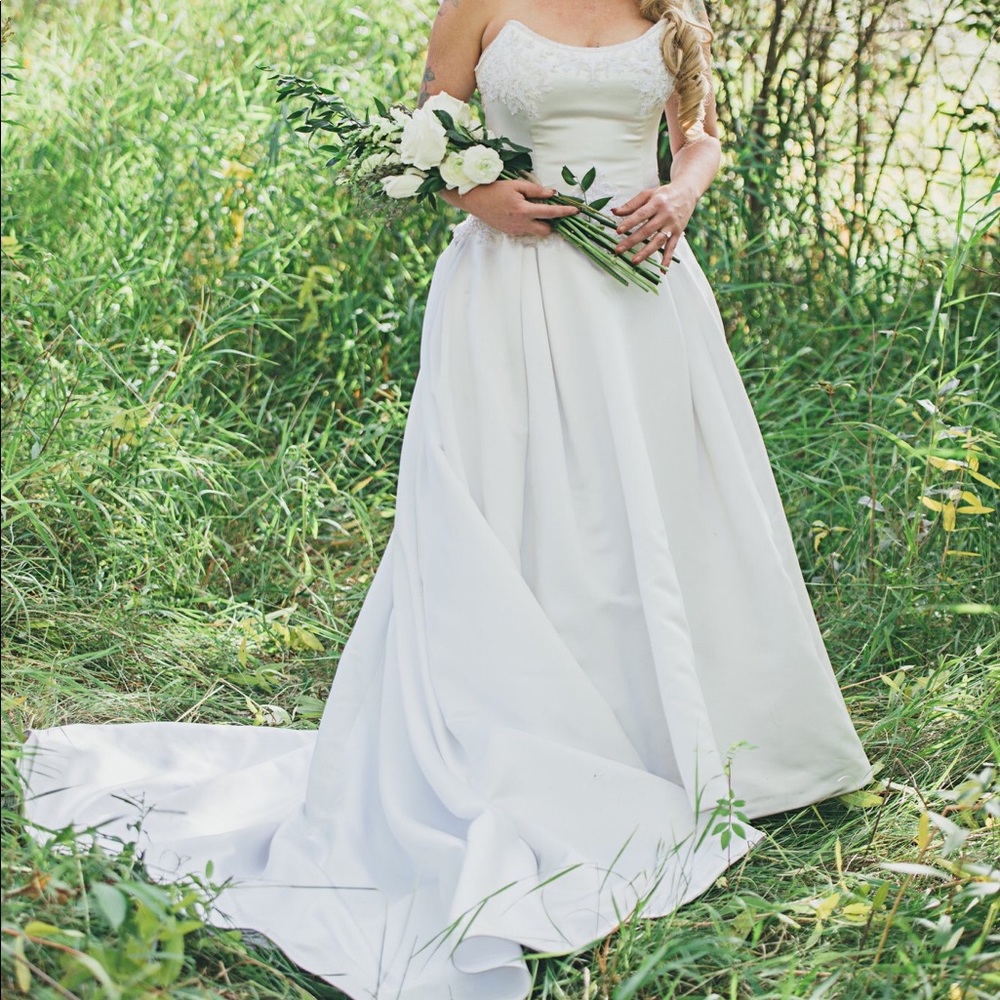 Embroidered satin wedding gown